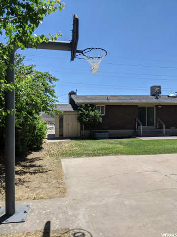 Back Corner to House with Storage