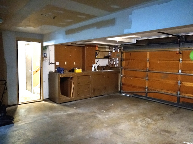 Large 2-car, heated, cooled, garage w/ workbench a