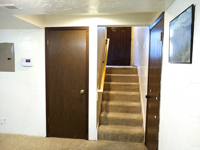 Stairs from garage leading to main floor