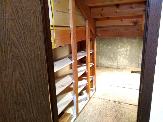 entrance to the large, lighted crawl space