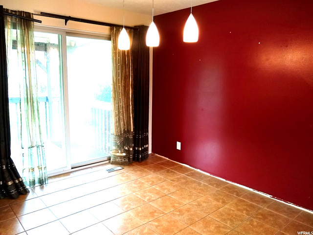 Large dining area leads to back deck