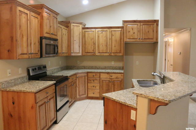 Open kitchen with granite countertops