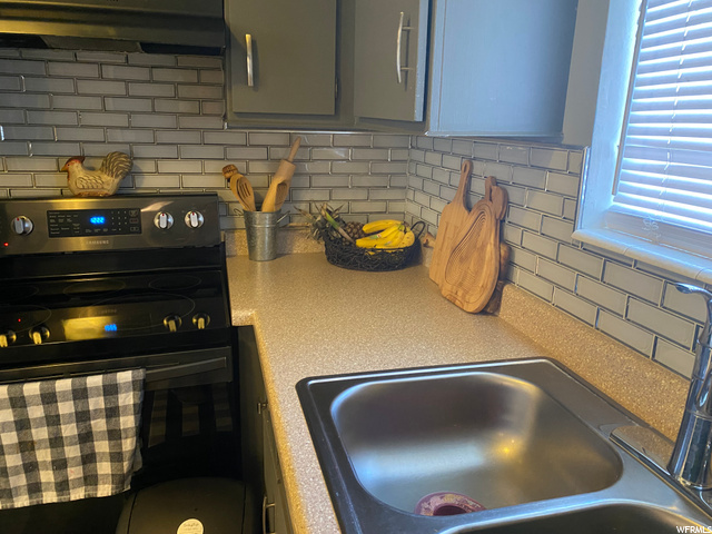 3393 S Oquirlane St, Magna, UT 84044 — photo 12