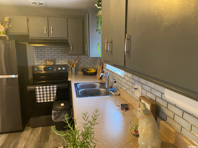 3393 S Oquirlane St, Magna, UT 84044 — photo 11