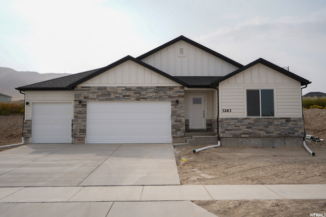 3263 BLUE HERON DR 505 Saratoga Springs, Utah New 3 car garage in Saratoga Springs 9 foot basement ceilings tankless water heater 96% furnace Lvp throughout main lvl covered deck Quartz counter tops Vaulted ceilings upgraded carpet 42inch cabinets with soft close drawers and doors Separate tub shower with 2 sinks in master bath Single basin kitchen undermount sink Fans in master and family room