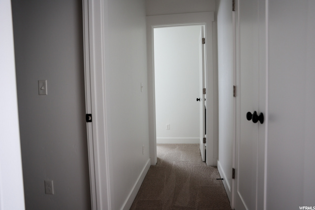 Hallway to bedrooms/closet