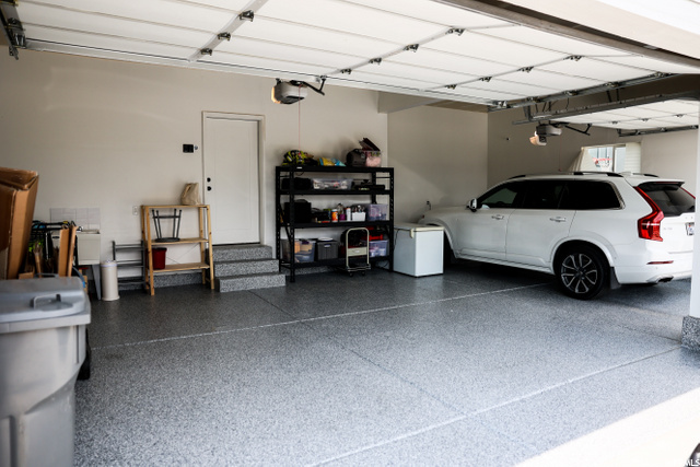 3 car garage with epoxy floor
