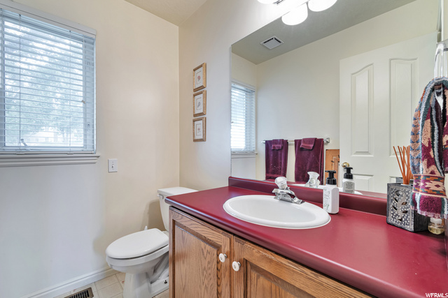 Main Level Half Bath off Garage