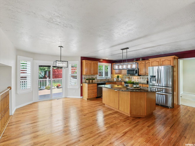 Large family dining, real hardwood flooring