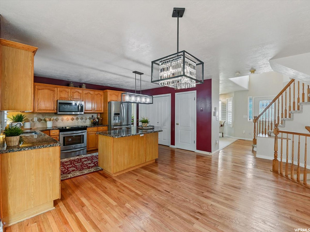 Large family dining, real hardwood flooring