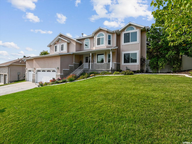 3-car garage with plenty of parking