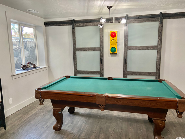 Basement bedroom showing barn doors.
