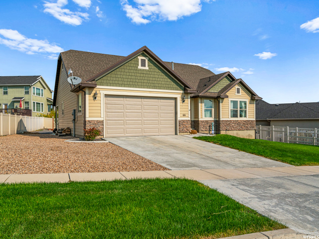 66 W WILDFLOWER DR N Saratoga Springs, Utah Gorgeous open rambler in serene, beautiful Stillwater neighborhood. Stunning lake/mountain views. Updated stainless kitchen, fully finished basement, well maintained, clean. Community amenities include pool, gym, clubhouse, pickle ball court, parks.