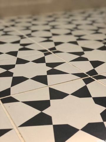 Detailed Tile Work in Main Floor Bathroom
