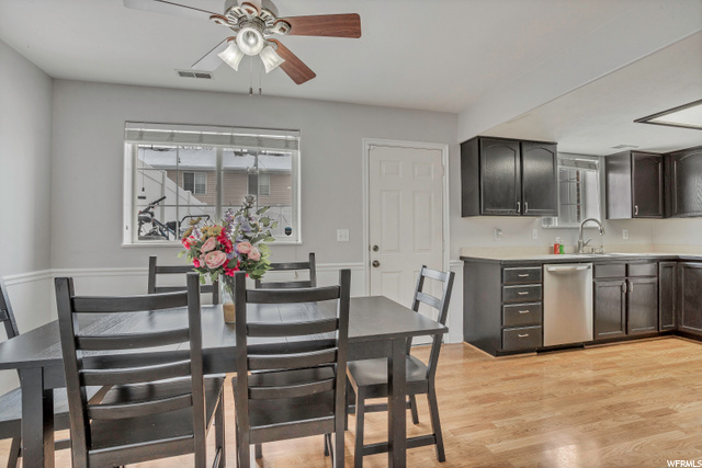 Dining area, kitchen, and back door.