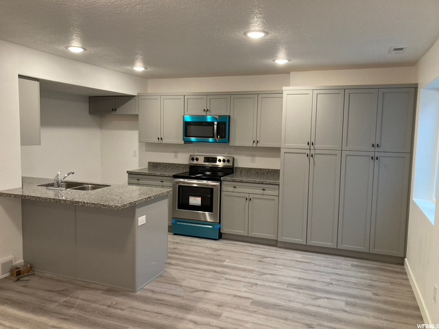 653 S Plum Creek Ln E, Ogden, UT 84404 — photo 2
