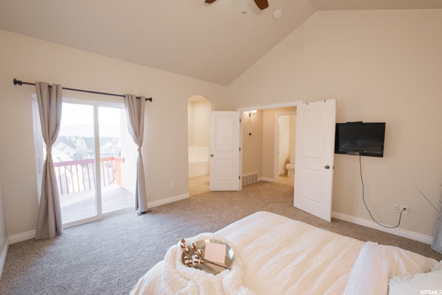 master suite on main level with large deck
