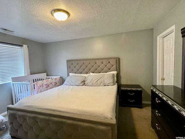 Bedroom one w/walk-in closet