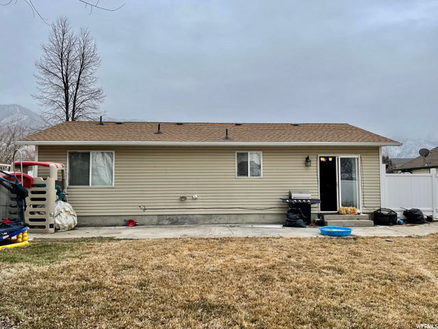 back of home with patio