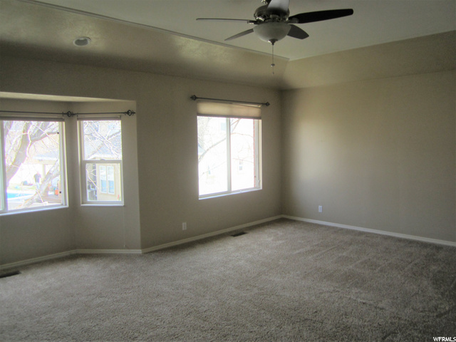 Another view of master bedroom showing coffered ce