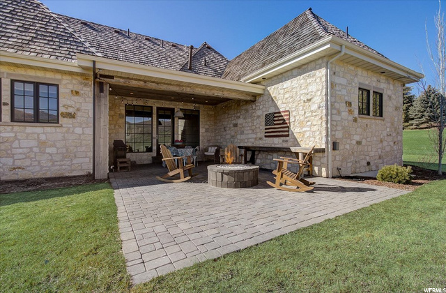 Shady North Patio With Built-in Fire Pit