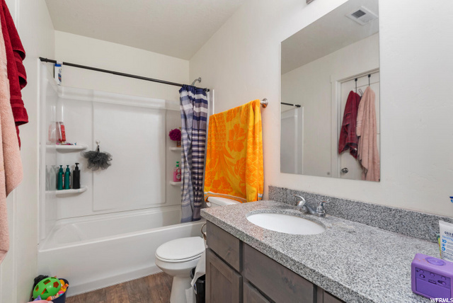 Mid-Unit Bathroom 1