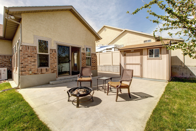 Backyard Patio with Storage Shed