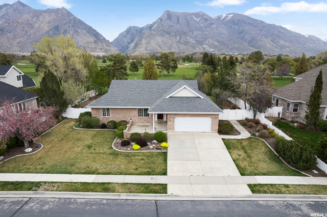 Exclusive Cornerstone neighborhood home in Highland backs to Alpine Country Club golf course with majestic mountain views!