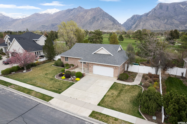Driving north on 5250 West, this home in on the east side with its stunning rocky mountain views!