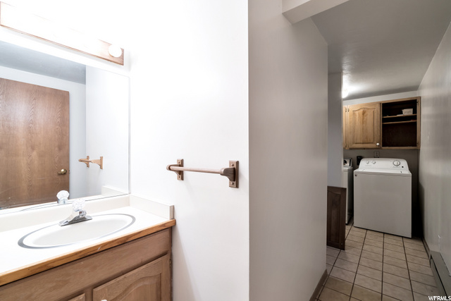 Half Bath & Laundry in Basement