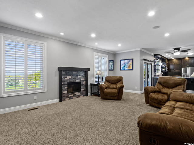 Great room with fireplace offers westward views