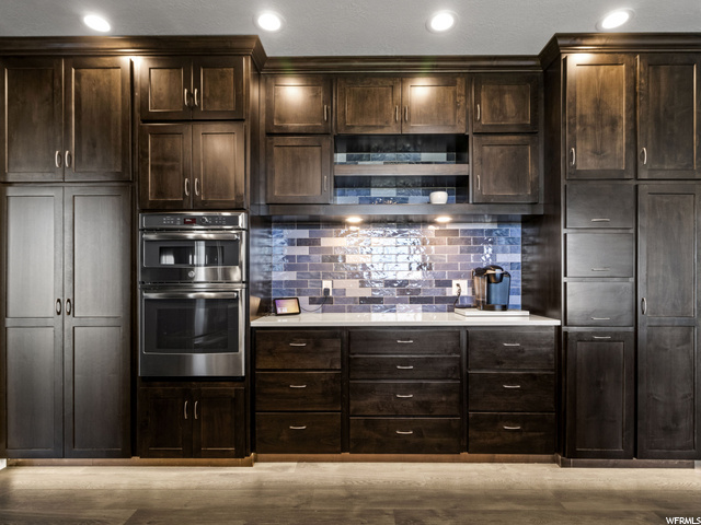 Two ovens, under cabinet drawers and appliance gar