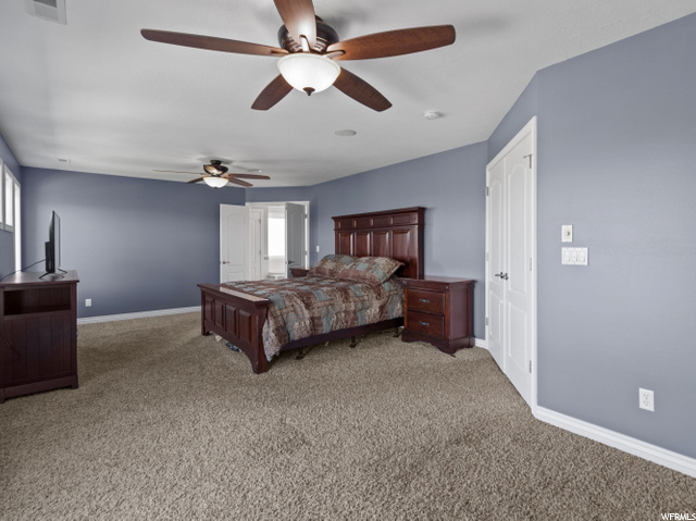 Spacious master bedroom with upper deck access