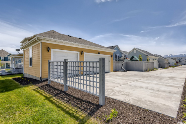 3 car garage with RV parking
