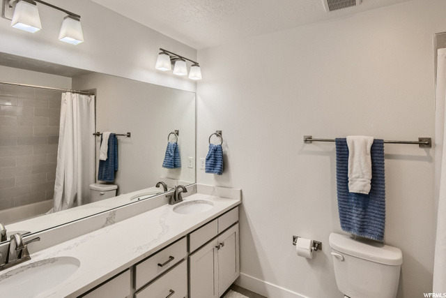 Extra upstairs full bathroom with double sink