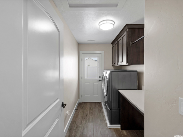 Large Laundry with folding counter, hanging space