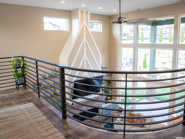 Beautiful metal railing looking down to family roo