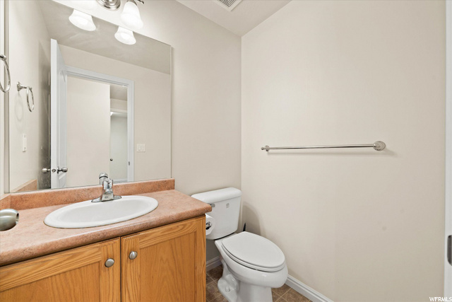 Half Bath by the Kitchen and Laundry room