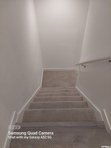 Off garage entrance, stairs down to landing &basem