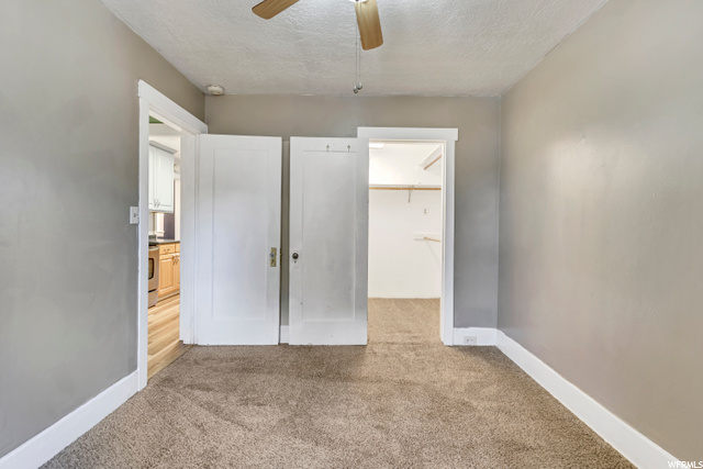Bedroom with walk in closet