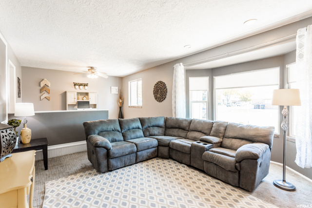 Entry and living room with space for formal dining