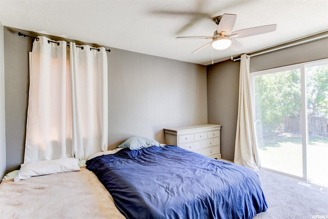 Primary bedroom with sliding doors