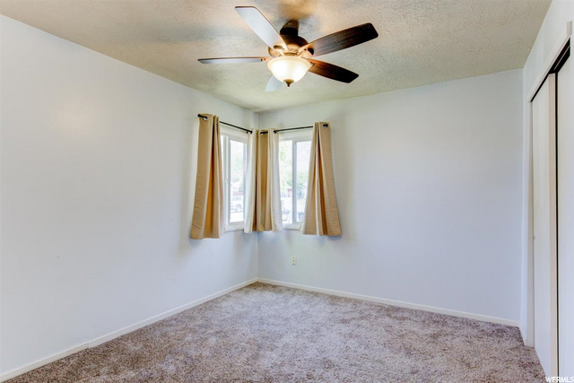 Bedroom #1 with front corner window
