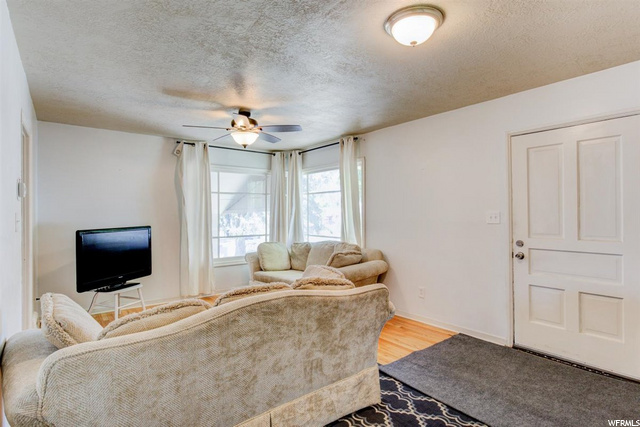 Living room, original hardwood and windows