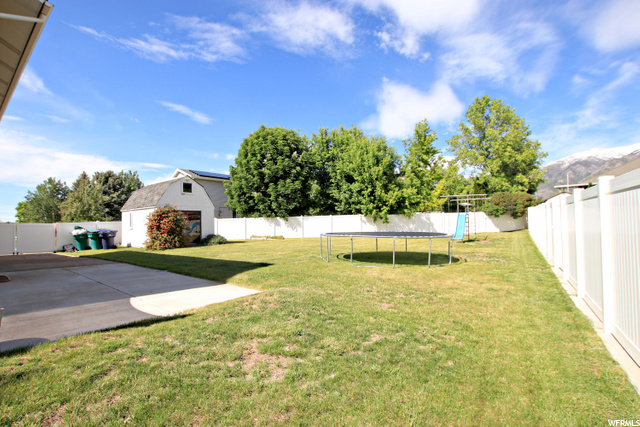 large back yard with RV pad