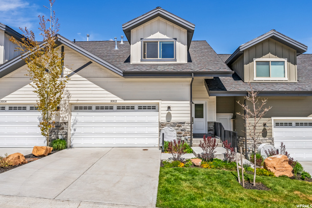 Front Exterior of this Like-new townhome