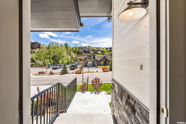 Front entry, just steps to amenities!