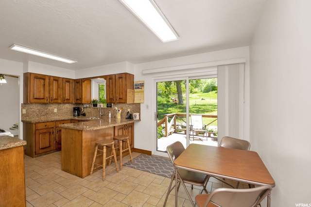 Kitchen dining & rear deck access