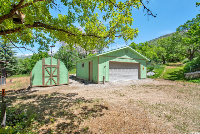 Two car oversized garage and storage shed