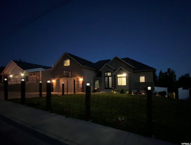 Fenced and Lighted Front Yard